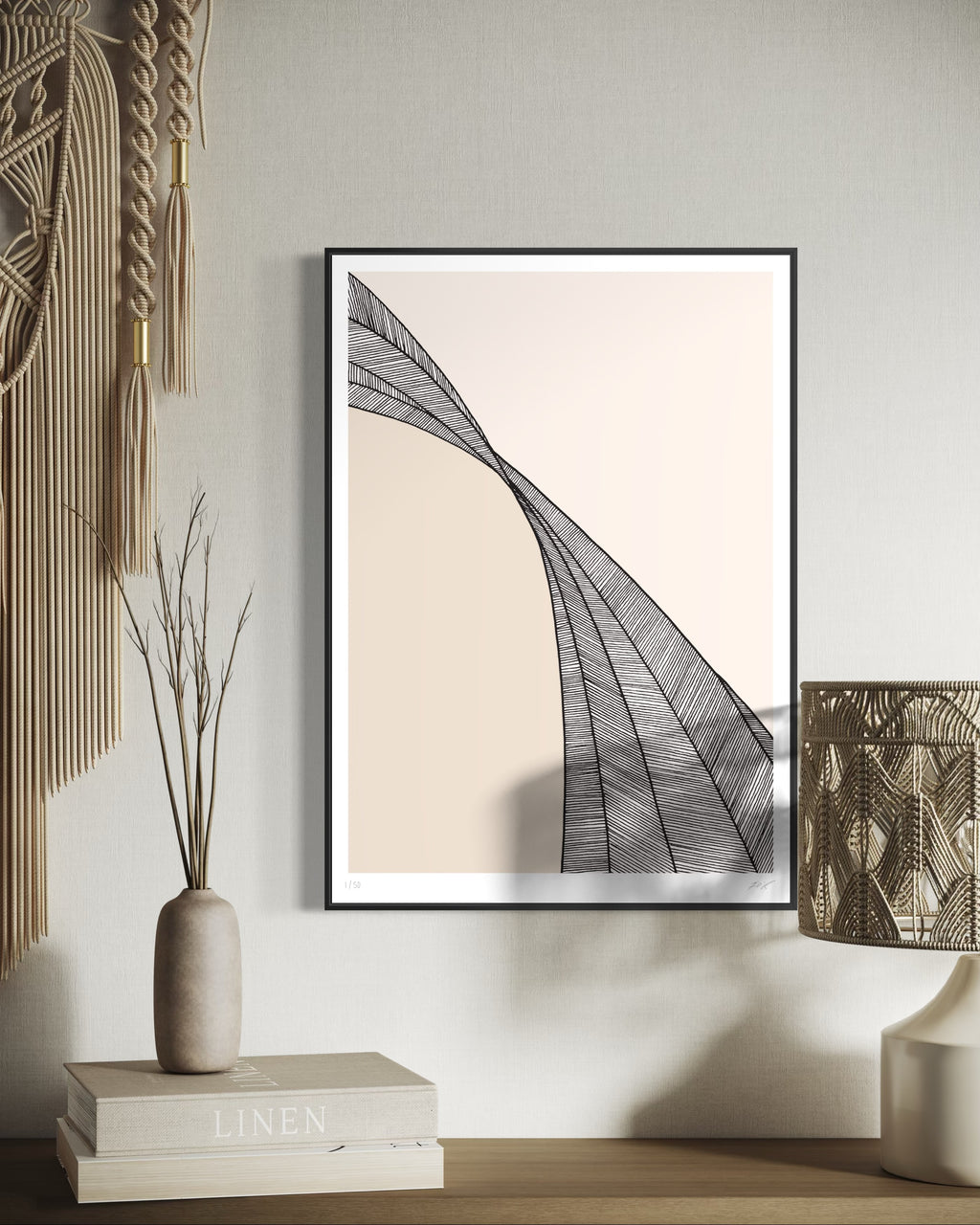 Framed abstract art piece on a wall with decorative elements below